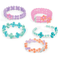 LINXO Seaside Jewelry Design Set featuring colorful bracelets made of plastic beads and elastic bands in various arrangements