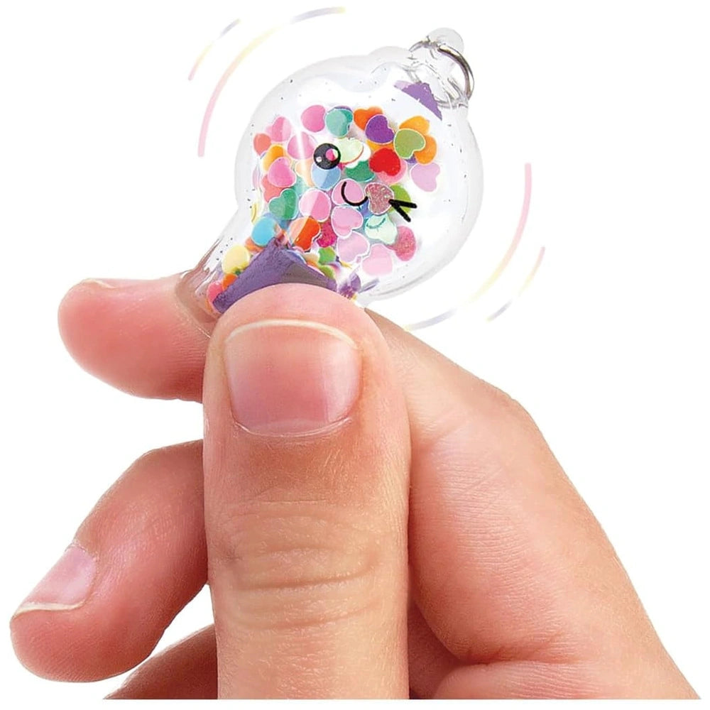 Pop Shake Twist Bracelet Set featuring a transparent plastic container with vibrant colored components in red, pink, yellow, 