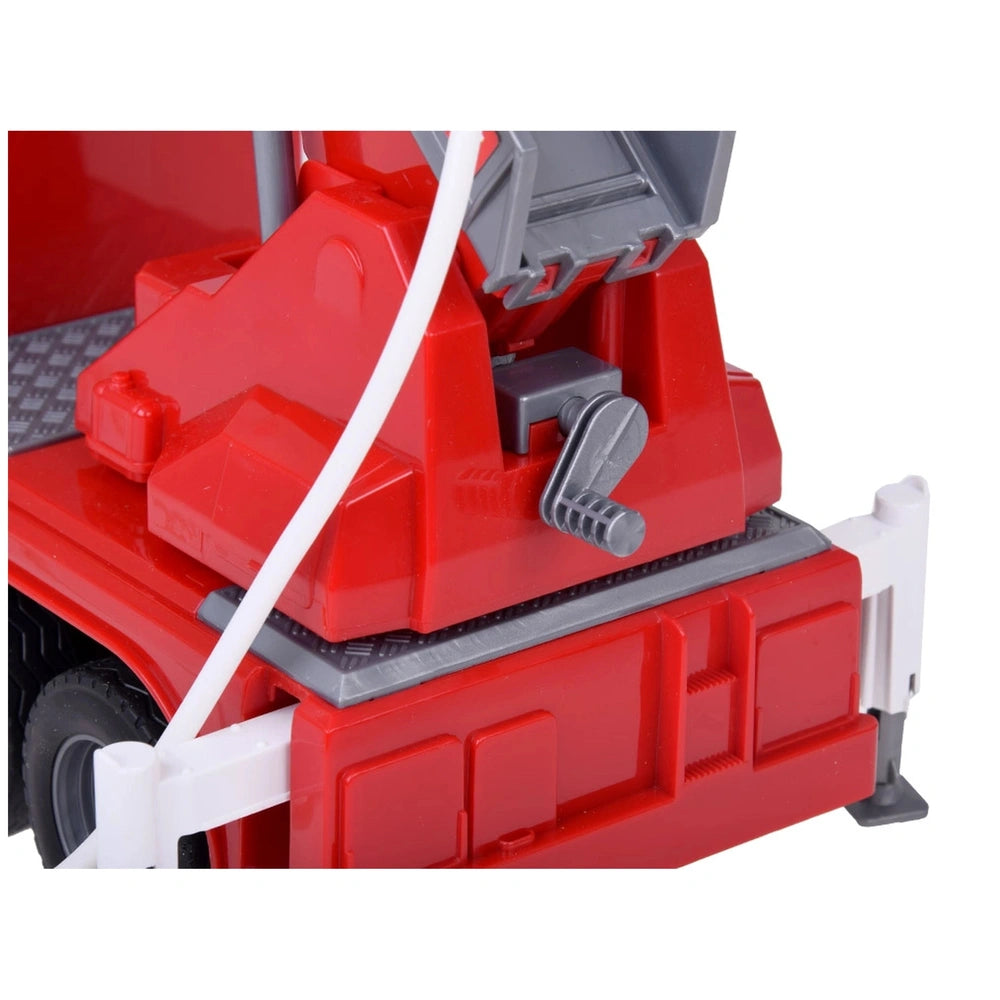 Red toy fire engine with a white hose attached, featuring a glossy plastic finish designed for children's play.