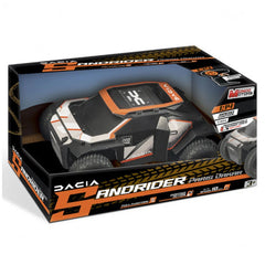 RC Dacia Sandrider toy vehicle in orange and black packaging with plastic window, featuring "PARIS DAKAR" and "4WD" text.