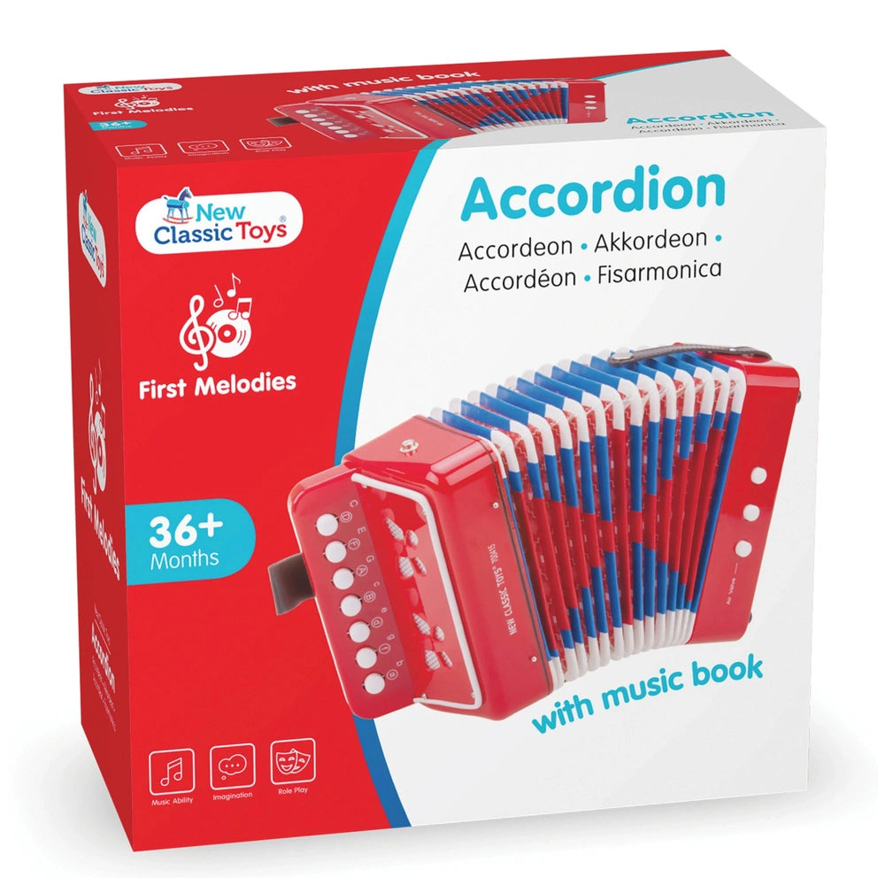 New Classic Toys accordion with music book in red packaging, featuring a glossy finish and clear window, visible blue and red