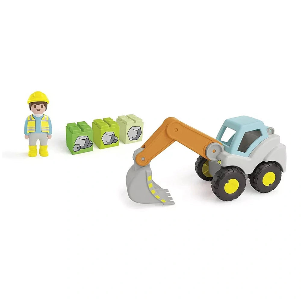 Playmobil Junior Shovel Excavator toy features a plastic construction worker in a yellow hard hat and blue vest with gray att