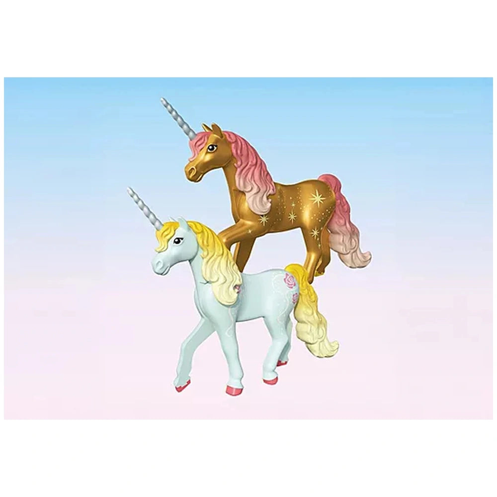 Playmobil Magic Unicorns toy playset features two glossy unicorn figures with pale blue and pink manes and metallic sheen.