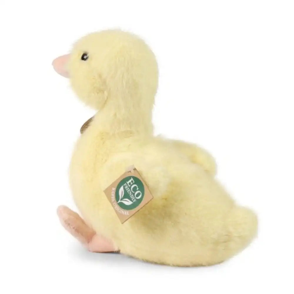 Plush duck toy in pale yellow with a fluffy texture and small black eye, set against a light background.