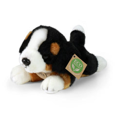 Plush Bernese mountain dog stuffed animal in black and white, resting on a white background with a brown eco-friendly tag.