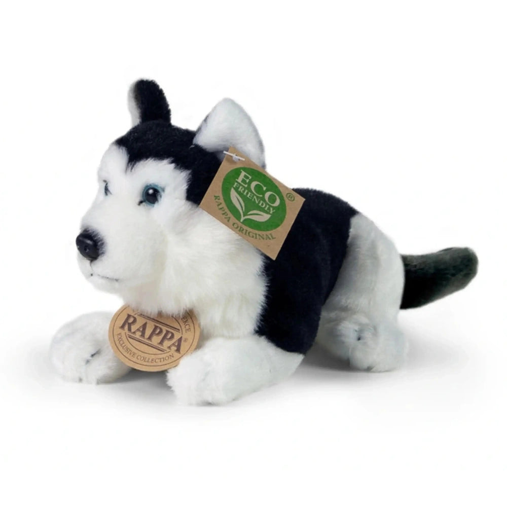 Plush husky dog toy with black markings and an eco-friendly tag attached to its ear, set against a plain white background.