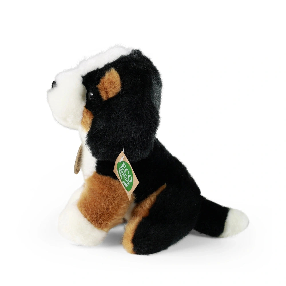 Plush mountain dog stuffed animal in black and brown, sitting upright with a smooth texture and small features.