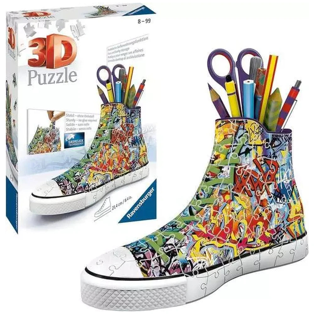 3D puzzle sneaker features a vibrant jigsaw design with colorful patterns, high-top style, and a glossy finish.