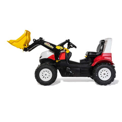Rollyfarmtrac Premium II Steyr 6300 Terrus CVT ride-on toy features a black body with red and white accents and a yellow scoo
