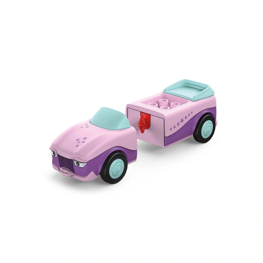 Siku Betty Blinky construction set features a pink toy car and a purple toy truck, both with blue wheels and driver figures.