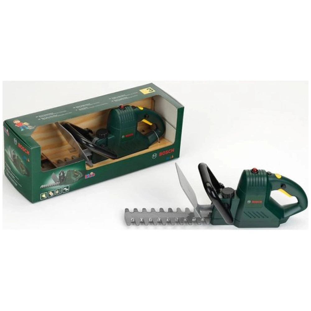 Theo Klein Bosch hedge trimmer in green with a silver blade attachment and black handle, displayed in clear packaging.